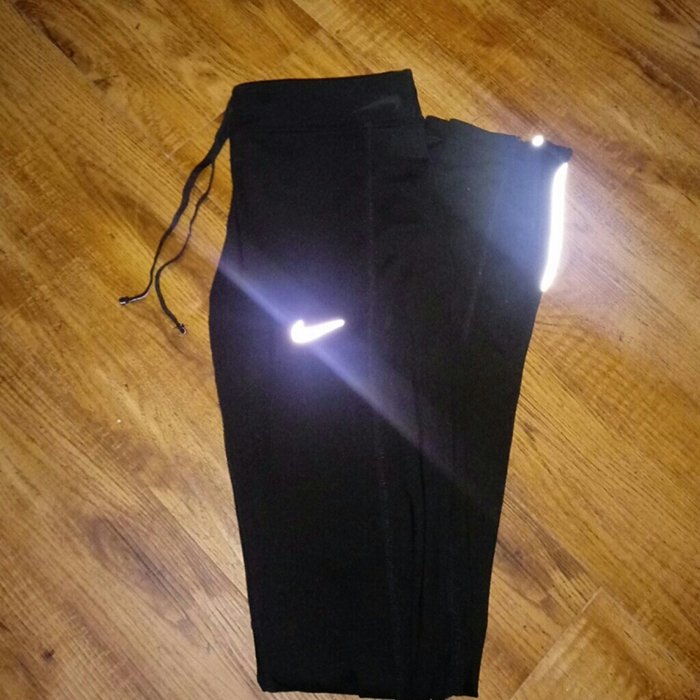 Dri-Fit Nike sport pants that unzip at the bottom